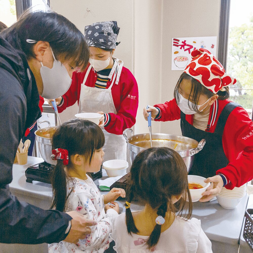 Students providing meals to local children.