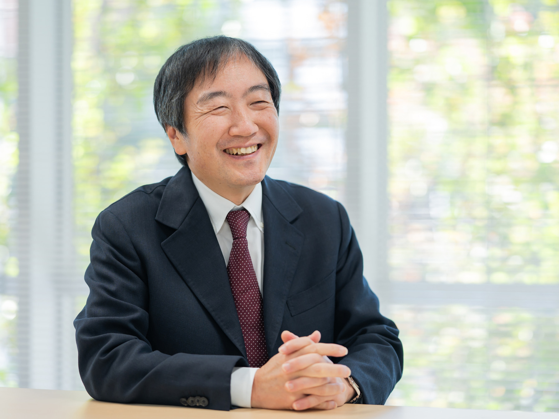 大墻敦先生がインタビューに応じている様子